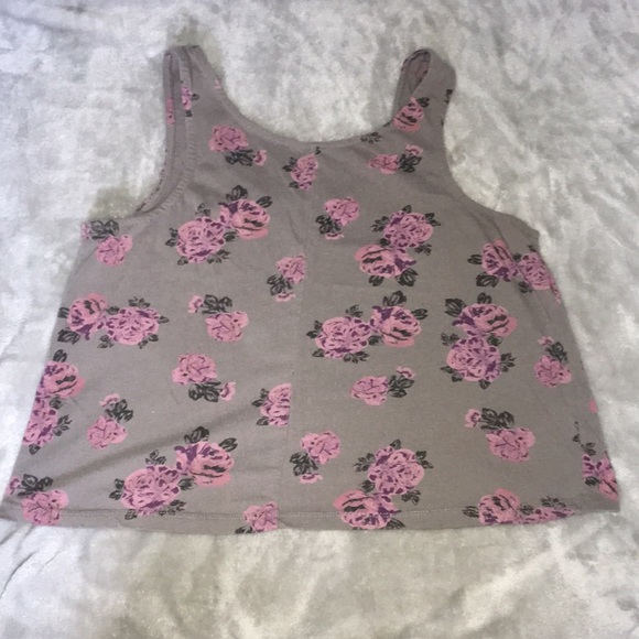 In between crop top and muscle shirt. - Picture 2 of 2